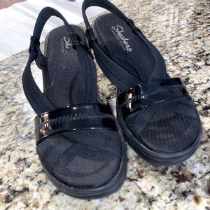 Women’s sketchers patent leather and stretch sandals. Size 8.5